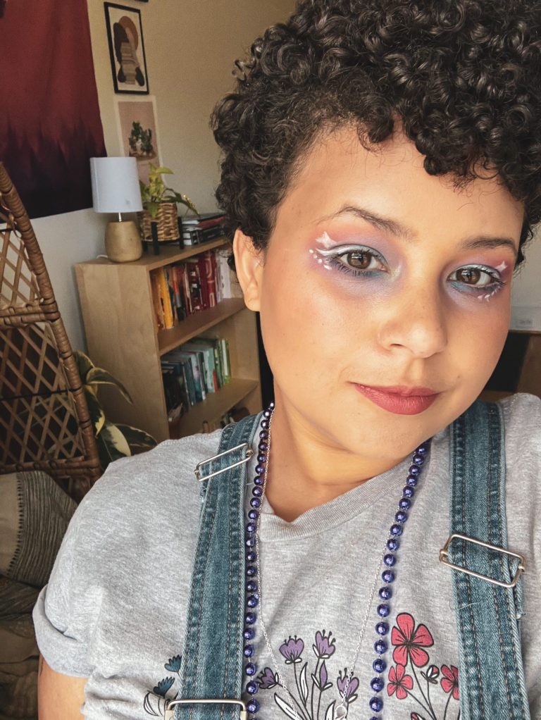 Make-up look inspired by the bi-pride flag colors: pink, purple and blue