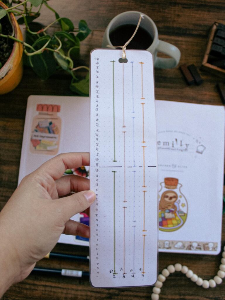A grid spacing bookmark used to mark out layouts in bullet journal spreads.